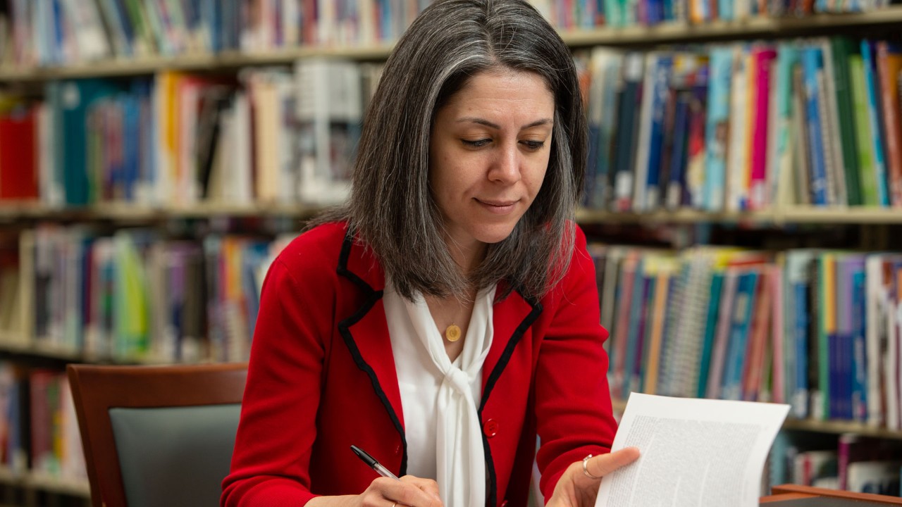 Woman studying in a library