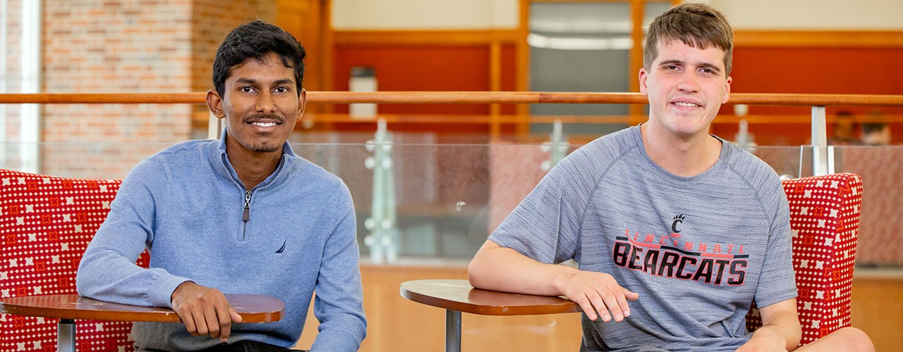 Student sits with special education program participant