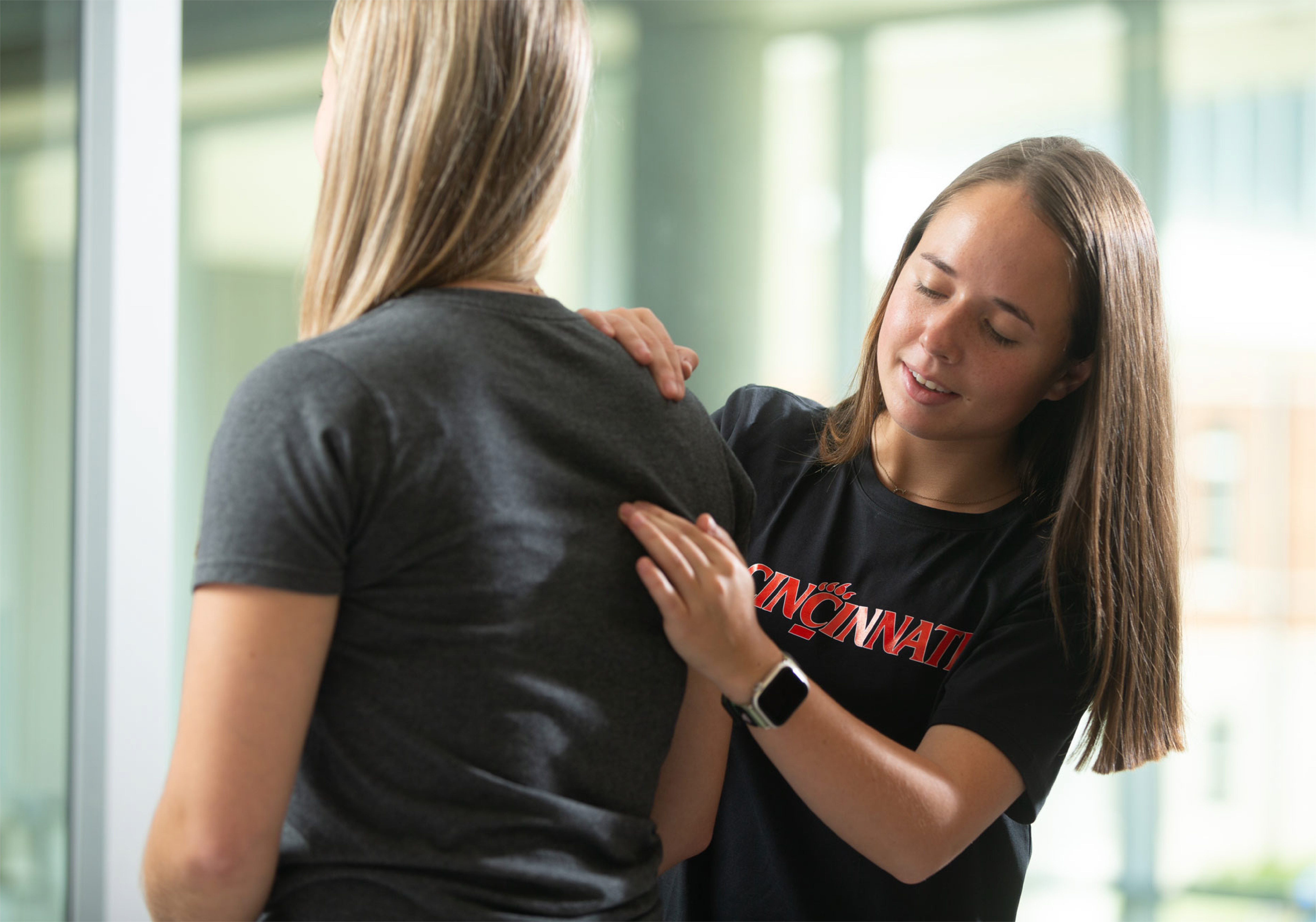 UC Student providing a health assessment.
